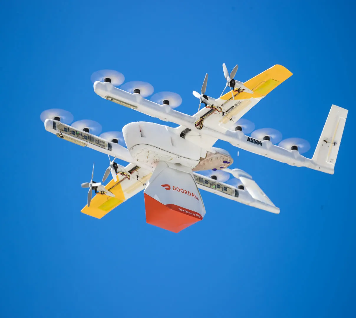 A drone operated by DoorDash delivering food